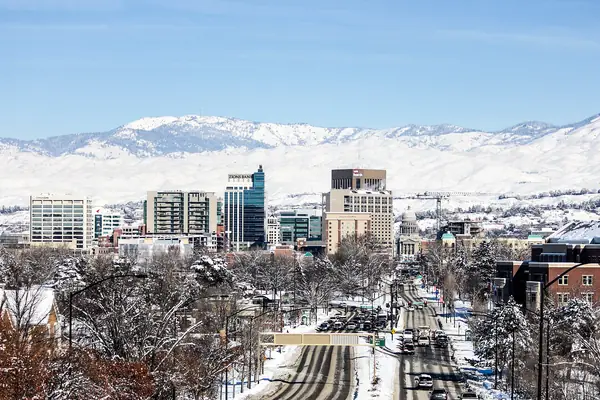 Downtown Boise, Idaho, in winter with the snow-covered foothills behind