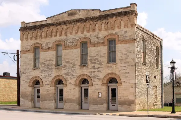 Historic limestone former post office building in downtown Round Rock, Texas